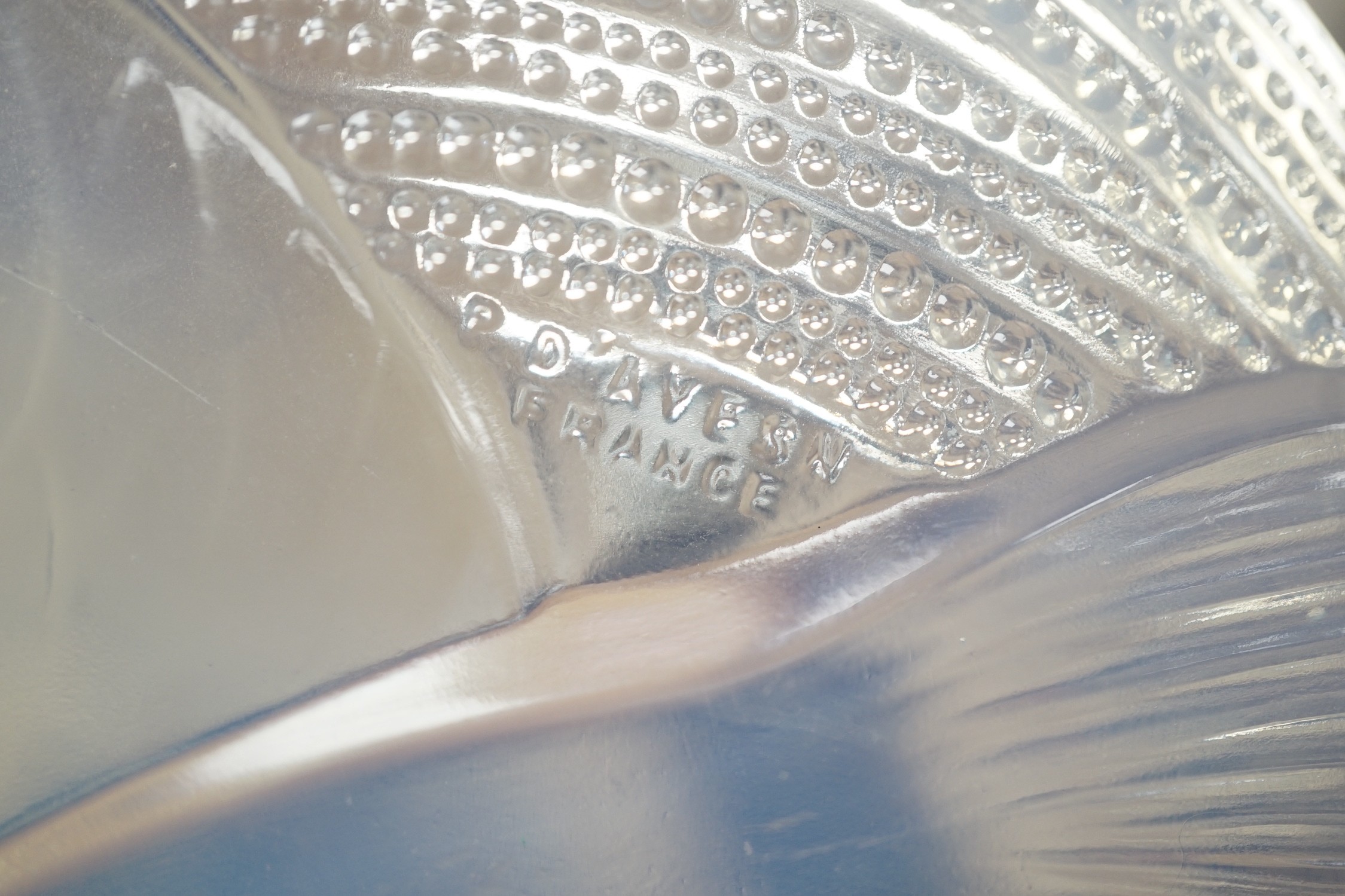 Pierre D'Avesn - a Lalique style opalescent glass dish, moulded in relief with three carp among waves, 30cm diameter